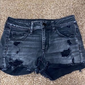 High waisted black distressed denim shorts